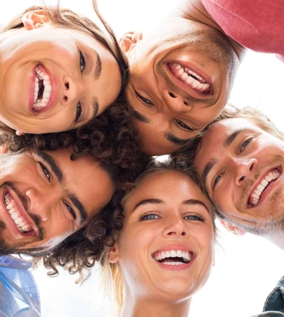 Smiling person showcasing white teeth after laser whitening treatment Burnley